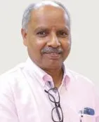 Dr Ravi Pachaiyappan founder of augie smiling wearing a light pink shirt